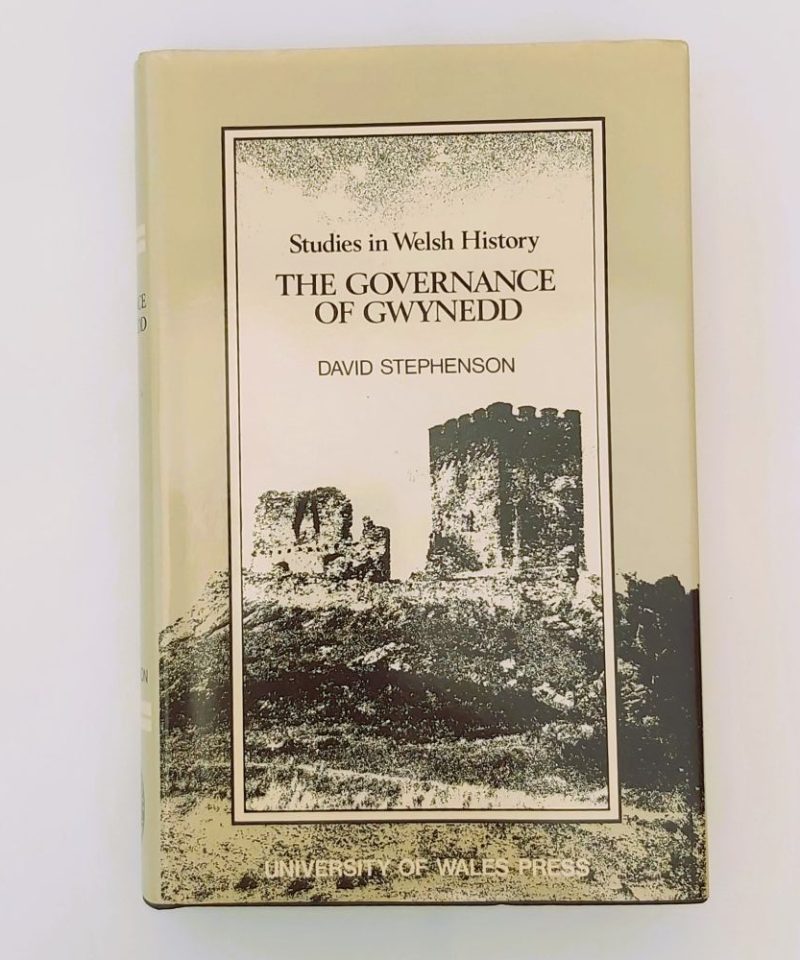 Governance of Gwynedd Front view of the book's pale cream paper dust jacket, featuring the title text "Studies in Welsh History: THE GOVERNANCE OF GWYNEDD" and author name "DAVID STEPHENSON" alongside a monochrome sketch of a medieval castle.Stephenson (2)a