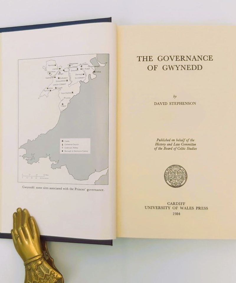 Governance of Gwynedd Open title page of the book dated 1984, alongside a monochrome historical map plate showing the geography of Gwynedd and historical sites associated with the medieval Welsh princes.Stephenson (4)a