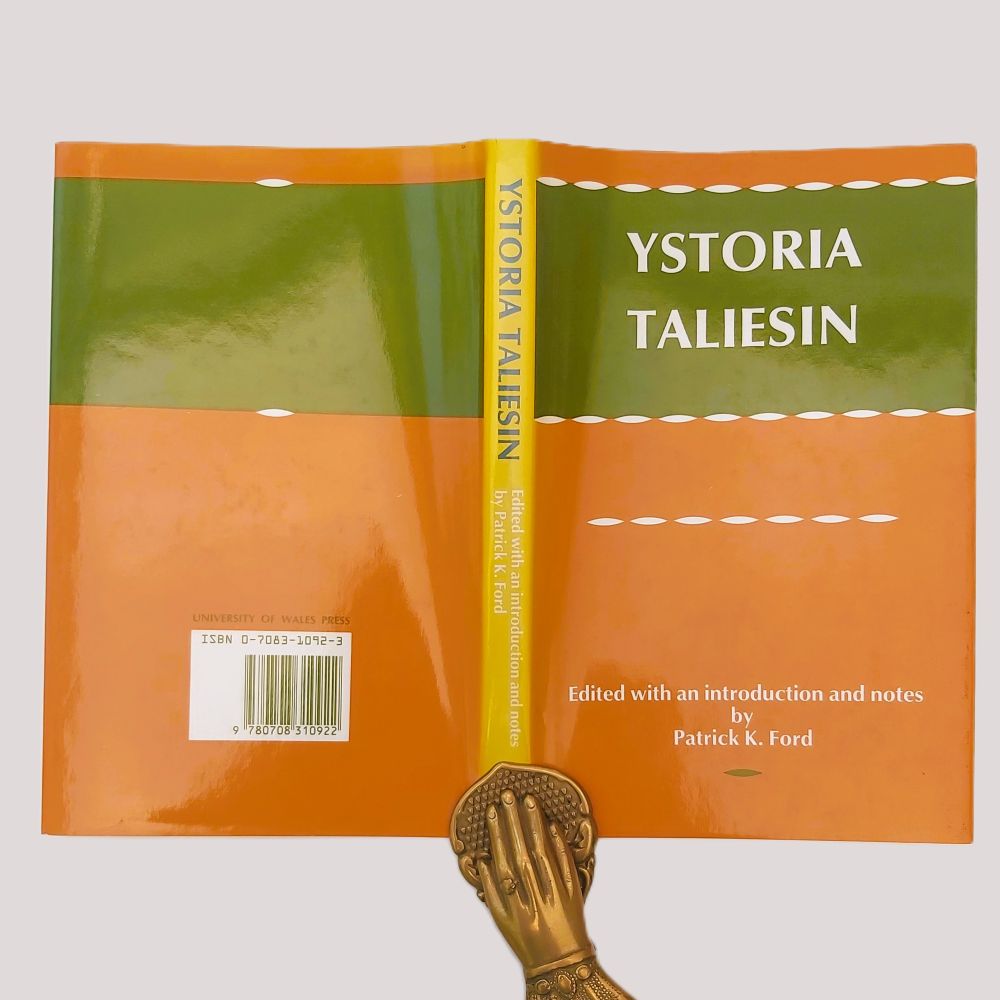 Ystoria Taliesin Ford (3)a Flat layout of the entire unfolded glossy dust jacket, showing the front cover, spine text, and back cover containing the barcode and University of Wales Press imprint with ISBN 0-7083-1092-3.